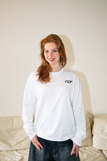The Longsleeve - “Steden schuilen niet wanneer het regent.”