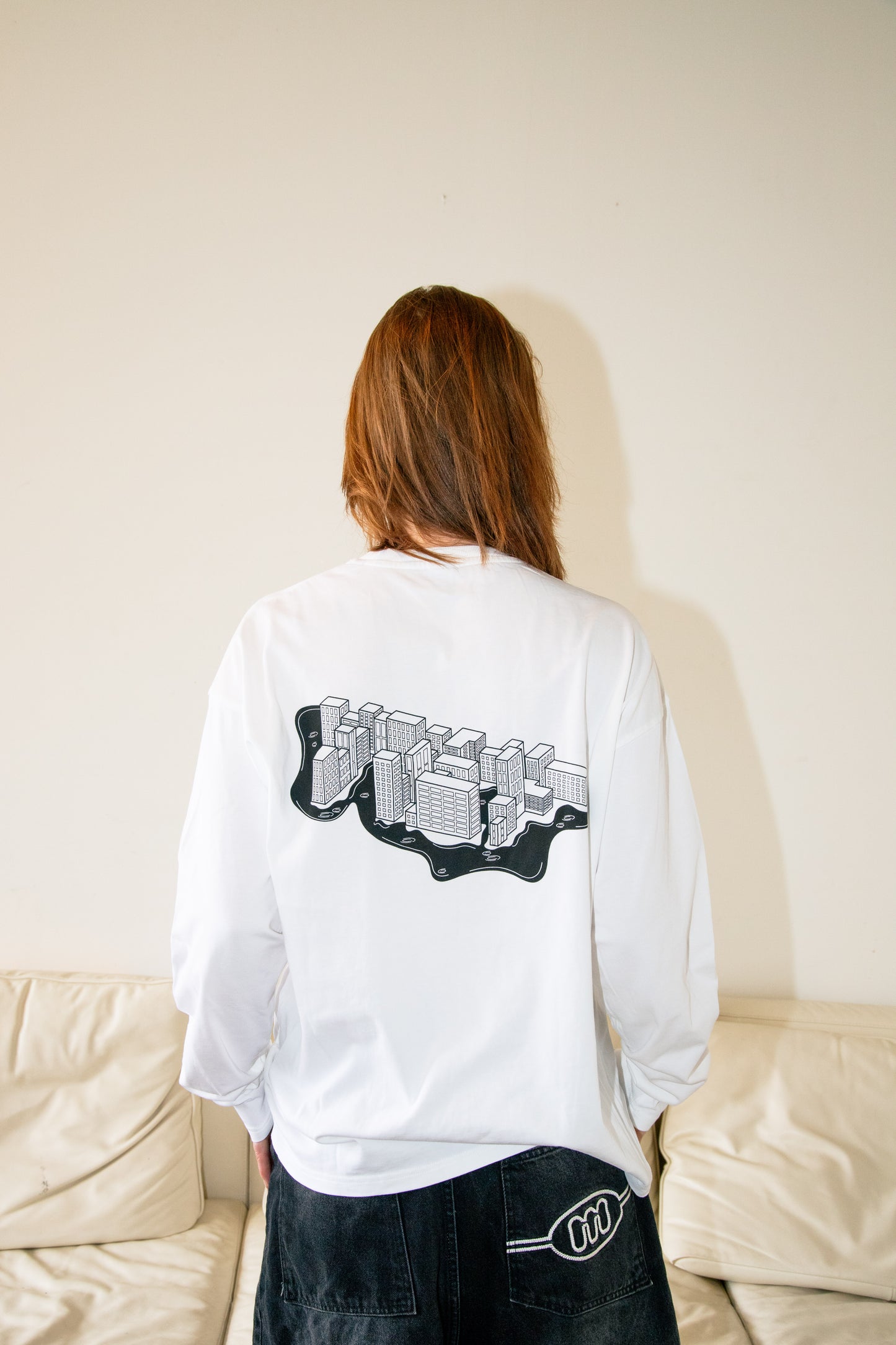 The Longsleeve - “Steden schuilen niet wanneer het regent.”