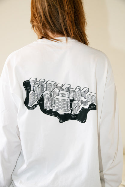 The Longsleeve - “Steden schuilen niet wanneer het regent.”
