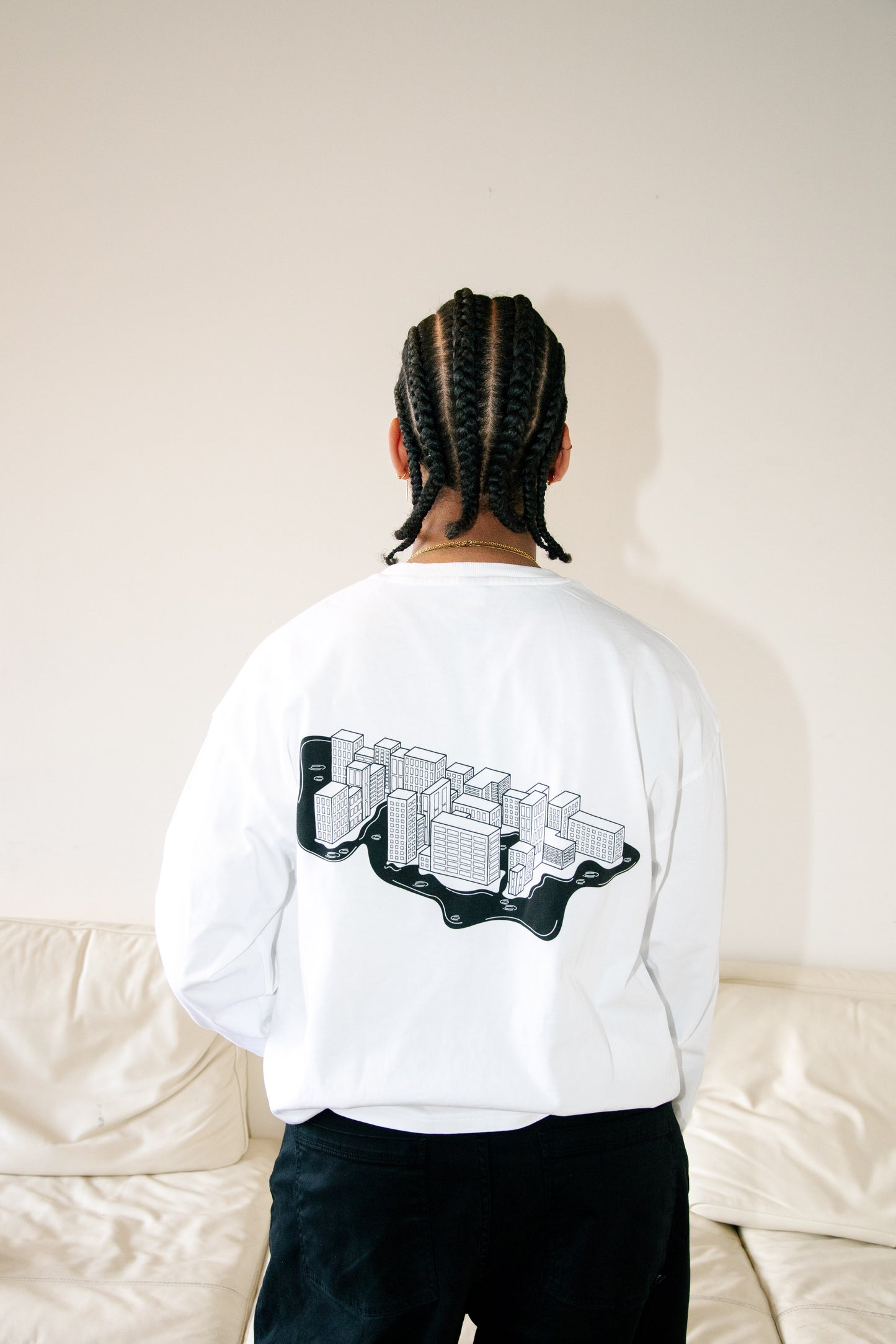 The Longsleeve - “Steden schuilen niet wanneer het regent.”